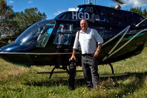 Bayleys Northland rural real estate agent John Barnett with a new tool for his trade.